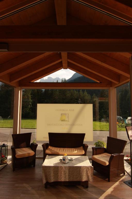 Posedenie v ubytovaní Albergo Ristorante Cacciatori