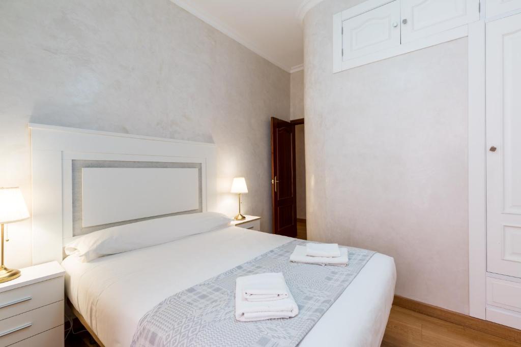 Postel nebo postele na pokoji v ubytování Conde Collection Gran Poder