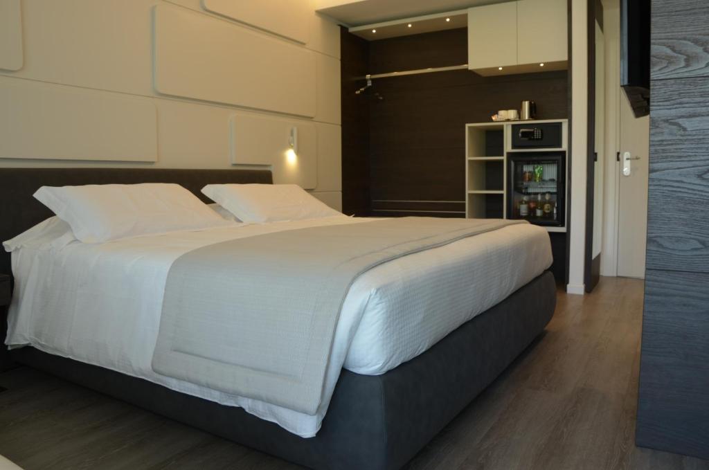 Postel nebo postele na pokoji v ubytování Solho Hotel