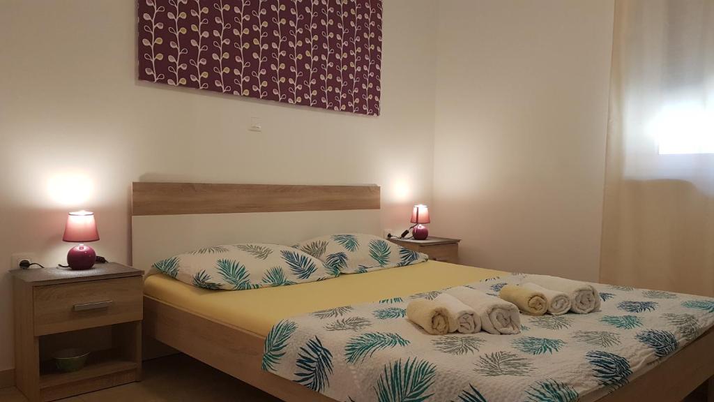 Postel nebo postele na pokoji v ubytování Apartments BRIST HILLS
