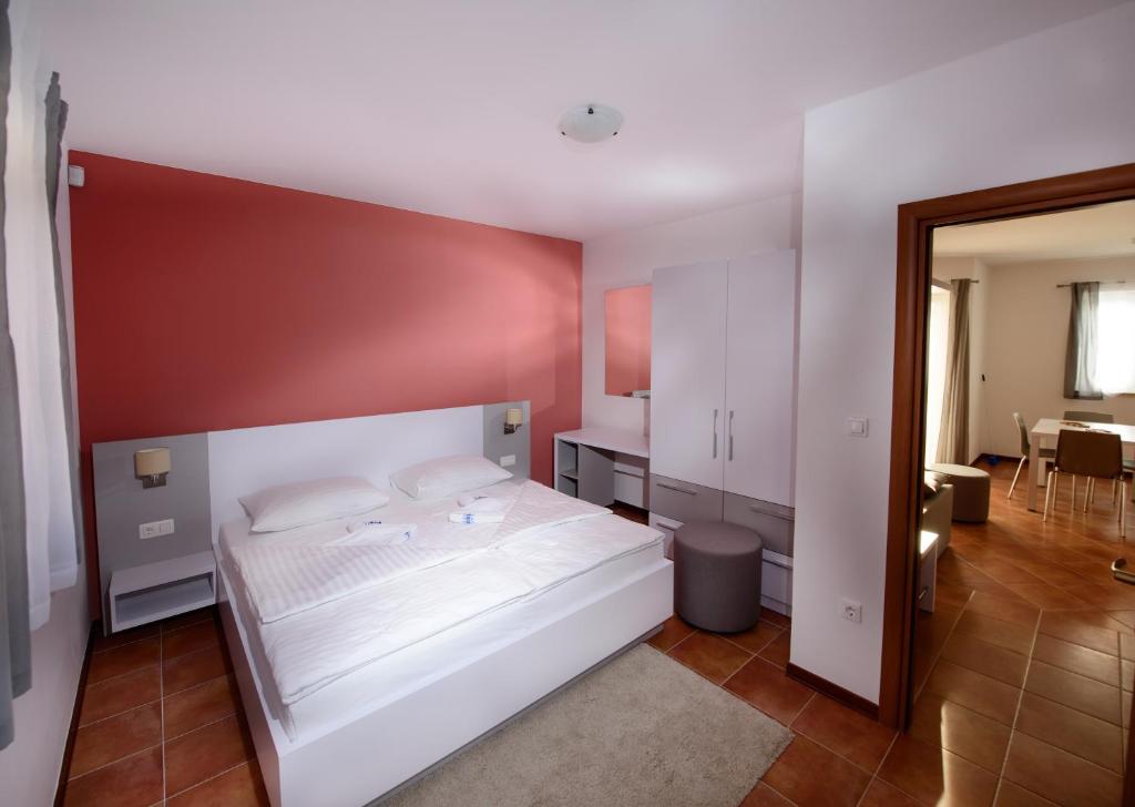 Postel nebo postele na pokoji v ubytování Plavo nebo Istra Apartments