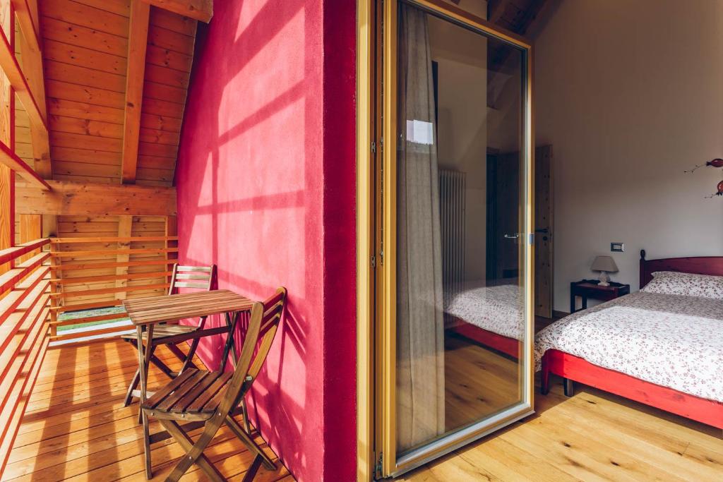 Letto o letti in una camera di Chalet Valcanale