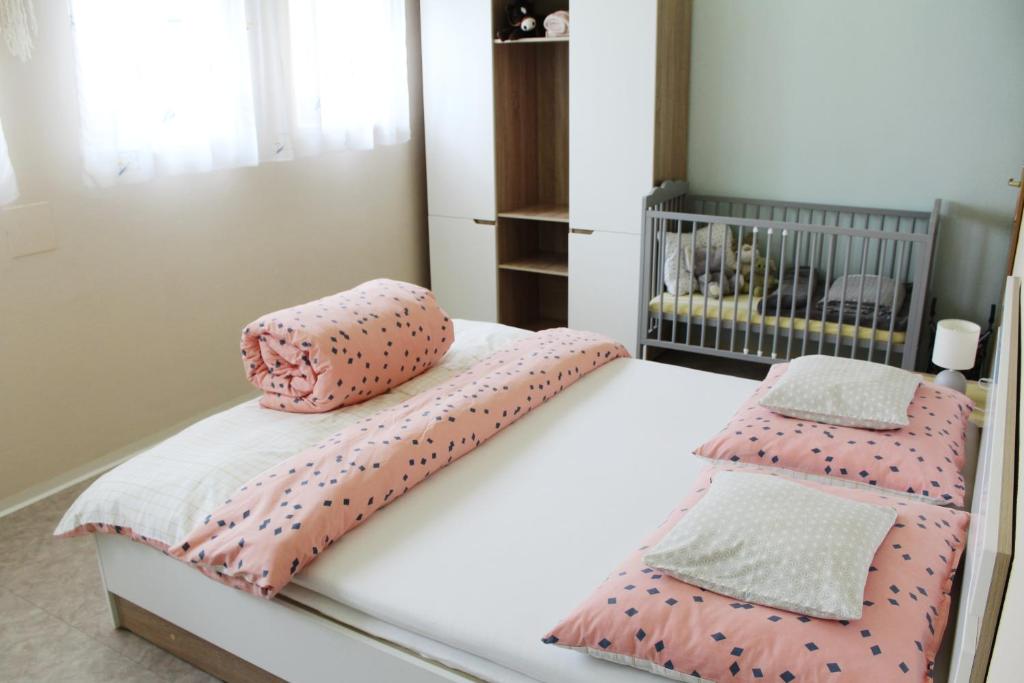 Postel nebo postele na pokoji v ubytování Apartmán "Pod Rokem"