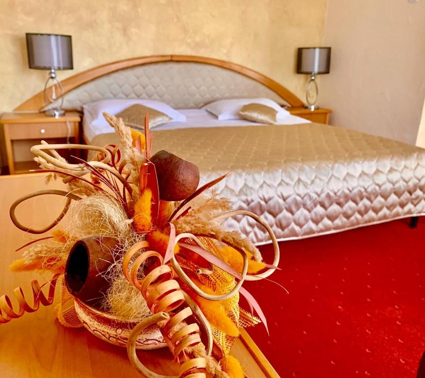 Postel nebo postele na pokoji v ubytování Hotel Belvedere