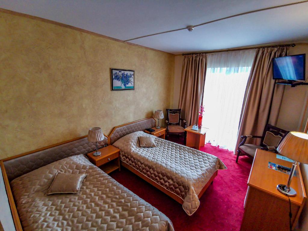 TV a/nebo společenská místnost v ubytování Hotel Belvedere