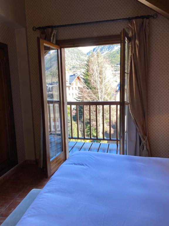 Postel nebo postele na pokoji v ubytování Hotel Bocalé