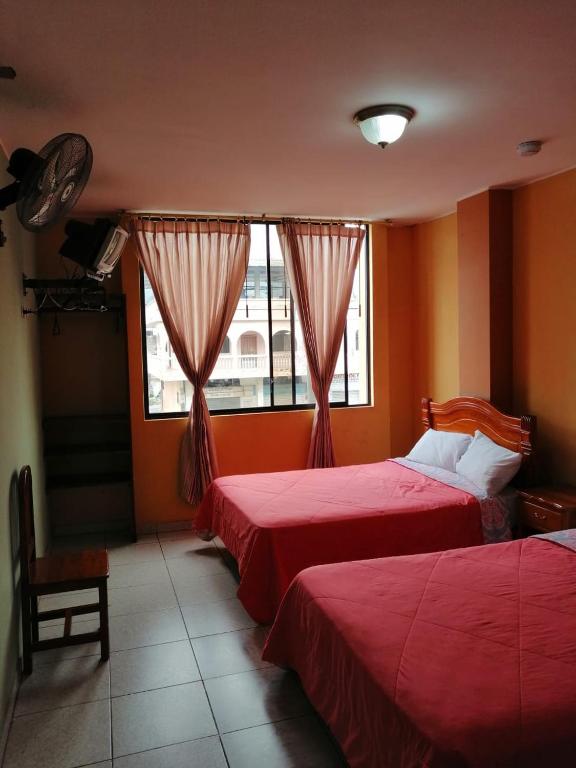 Postel nebo postele na pokoji v ubytování Hotel Sánchez Internacional