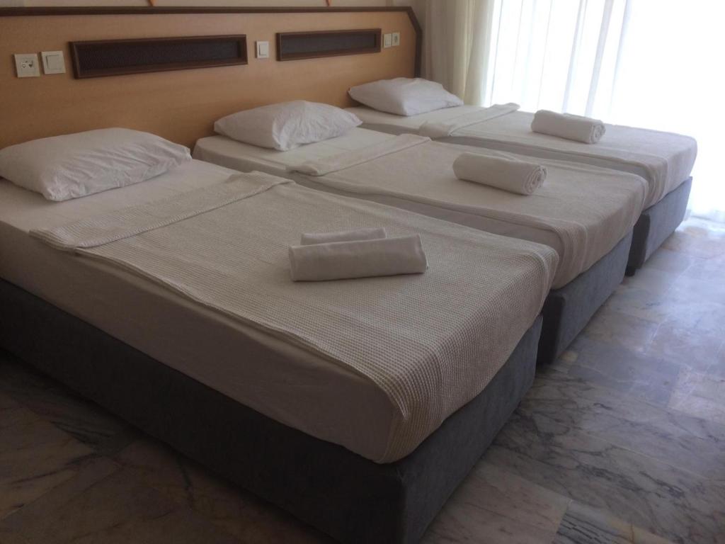 Postel nebo postele na pokoji v ubytování Side Özgürhan Hotel