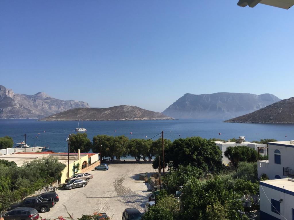 arial view of a parking lot next to a body of water at Fotini Studios in Emborios Kalymnos