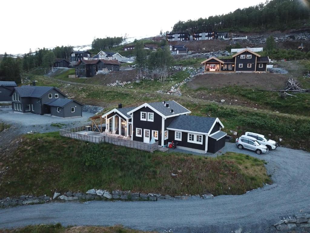 an aerial view of a house on a hill at Pudderhytta in Sogndal