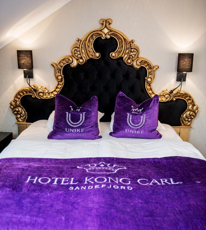 Postel nebo postele na pokoji v ubytování Hotel Kong Carl - Unike Hoteller