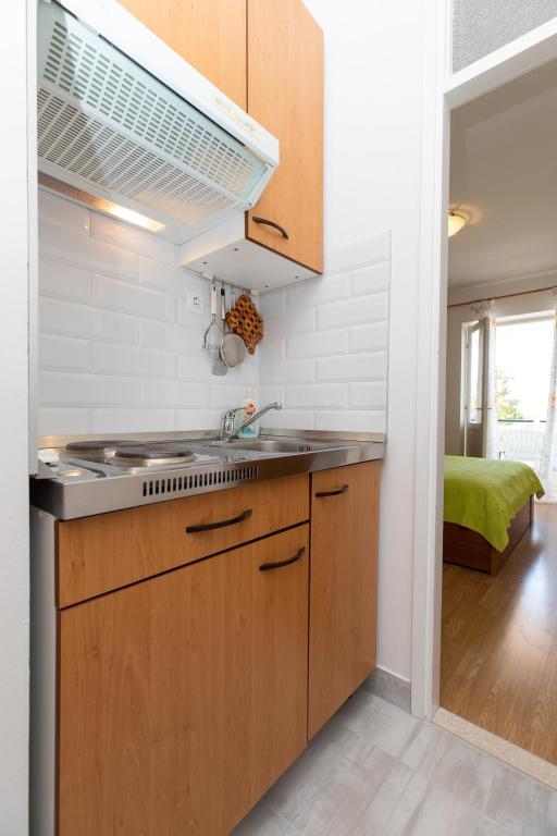Kuchyň nebo kuchyňský kout v ubytování Apartman Meira br 2