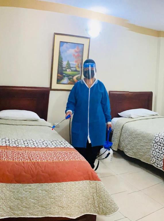 Postel nebo postele na pokoji v ubytování Hotel Caluva