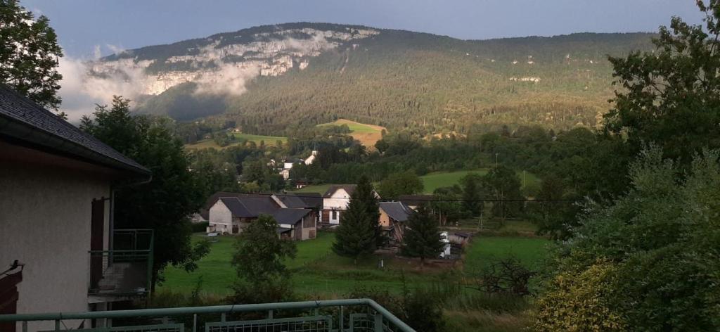 a view of a mountain from a house at Studio entre lac et montagne in Attignat-Oncin