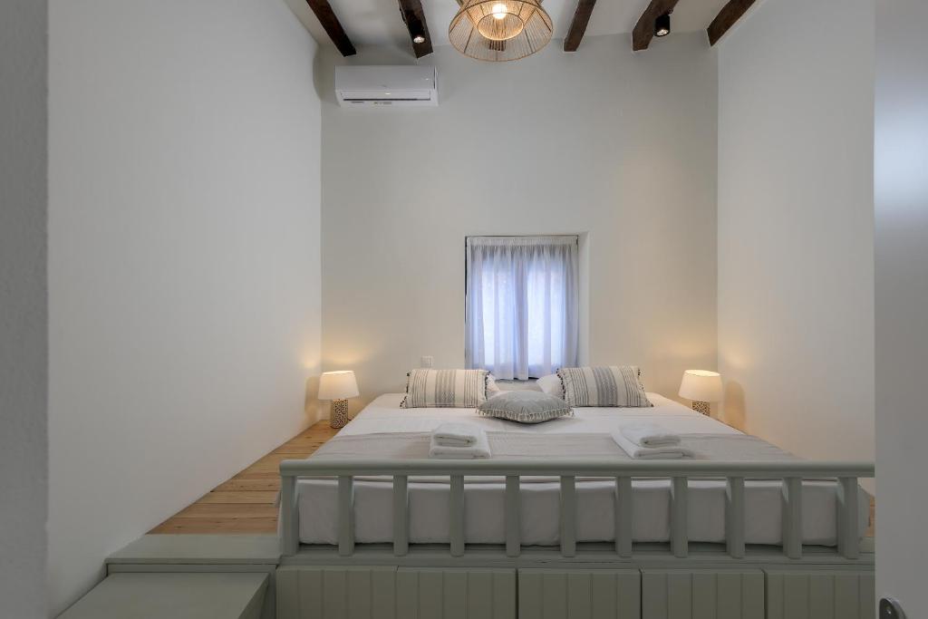 Postel nebo postele na pokoji v ubytování Kite Blue Villas