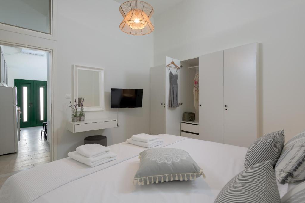 Postel nebo postele na pokoji v ubytování Kite Blue Villas
