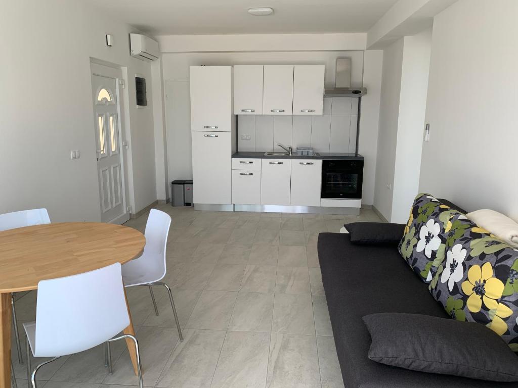 Kuchyň nebo kuchyňský kout v ubytování Elona Apartments