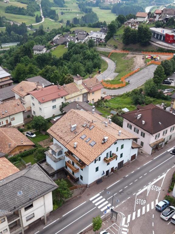 an aerial view of a town with houses and a street at Casa Sartori in Tesero