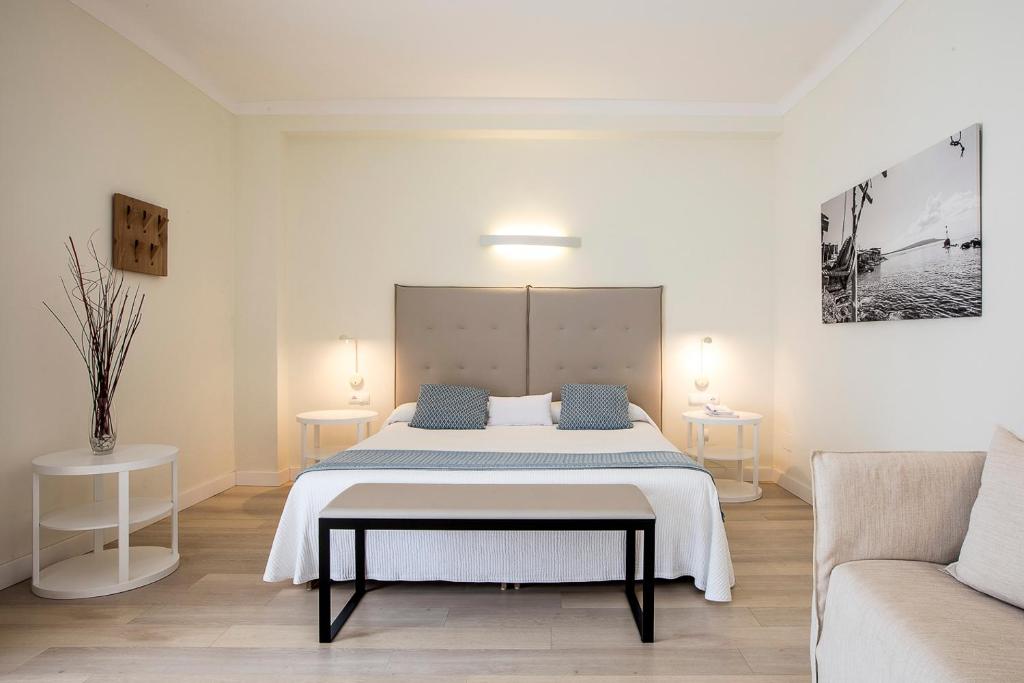 Postel nebo postele na pokoji v ubytování Hotel Levante