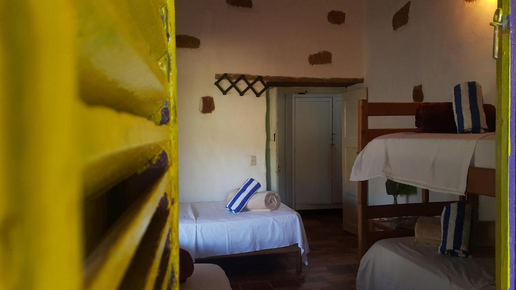 Postel nebo postele na pokoji v ubytování Surrona