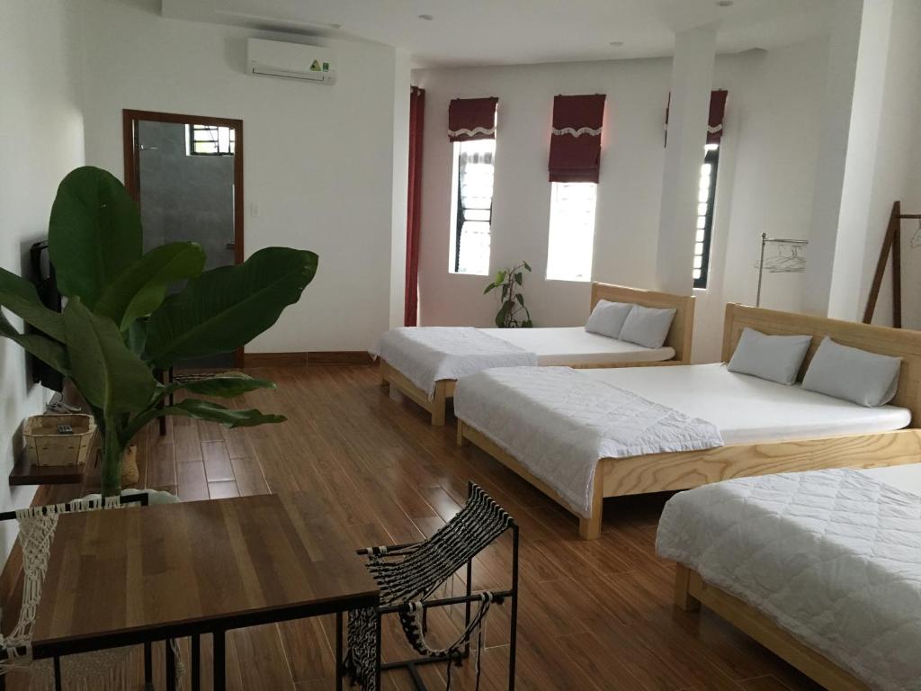 Postel nebo postele na pokoji v ubytování Ken King 2 - homestay gần biển giá rẻ