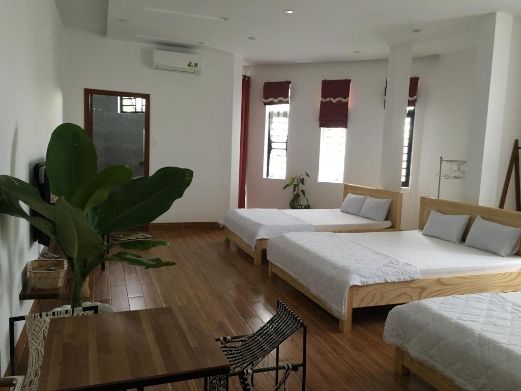 Postel nebo postele na pokoji v ubytování Ken King 2 - homestay gần biển giá rẻ