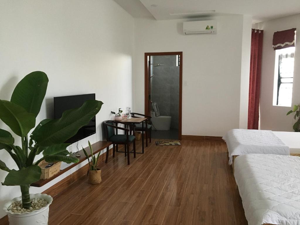 Postel nebo postele na pokoji v ubytování Ken King 2 - homestay gần biển giá rẻ