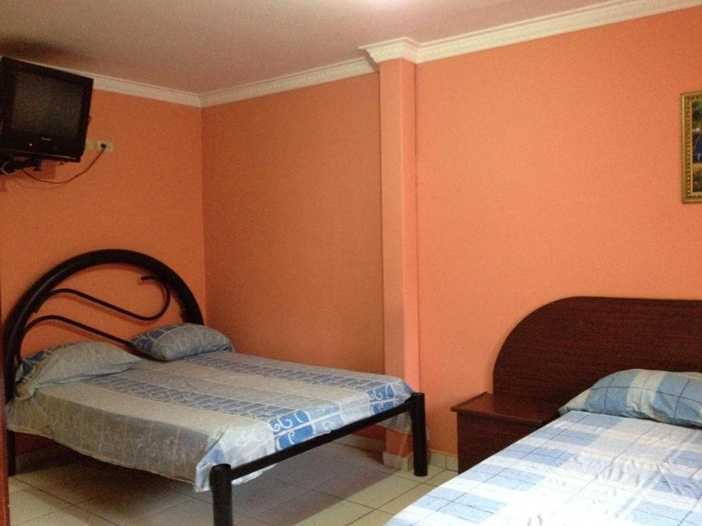 Postel nebo postele na pokoji v ubytování Residencial Turistico Cuba