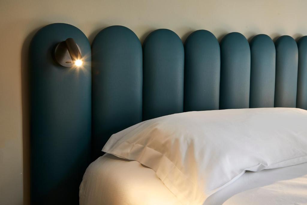 A bed or beds in a room at Hotel Europa