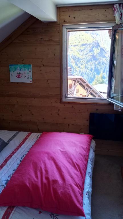 Postel nebo postele na pokoji v ubytování Avoriaz cocooning