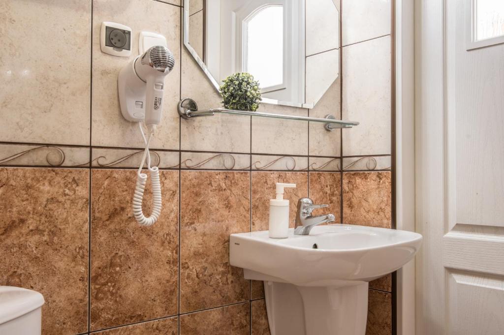 Kúpeľňa v ubytovaní Pokoje Widokowe Sywarne