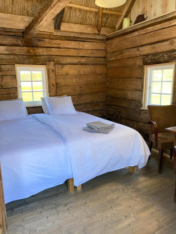 Postel nebo postele na pokoji v ubytování Jaagu-Mihkli Muhu Island