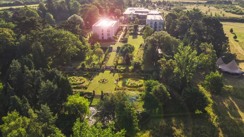 an aerial view of a house and a garden at Lifehouse Spa And Hotel in Frinton-on-Sea