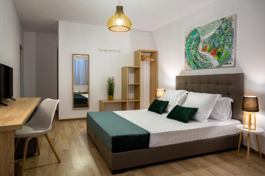 Postel nebo postele na pokoji v ubytování Lagom Hotel
