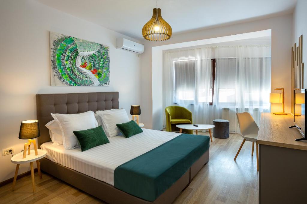 Postel nebo postele na pokoji v ubytování Lagom Hotel