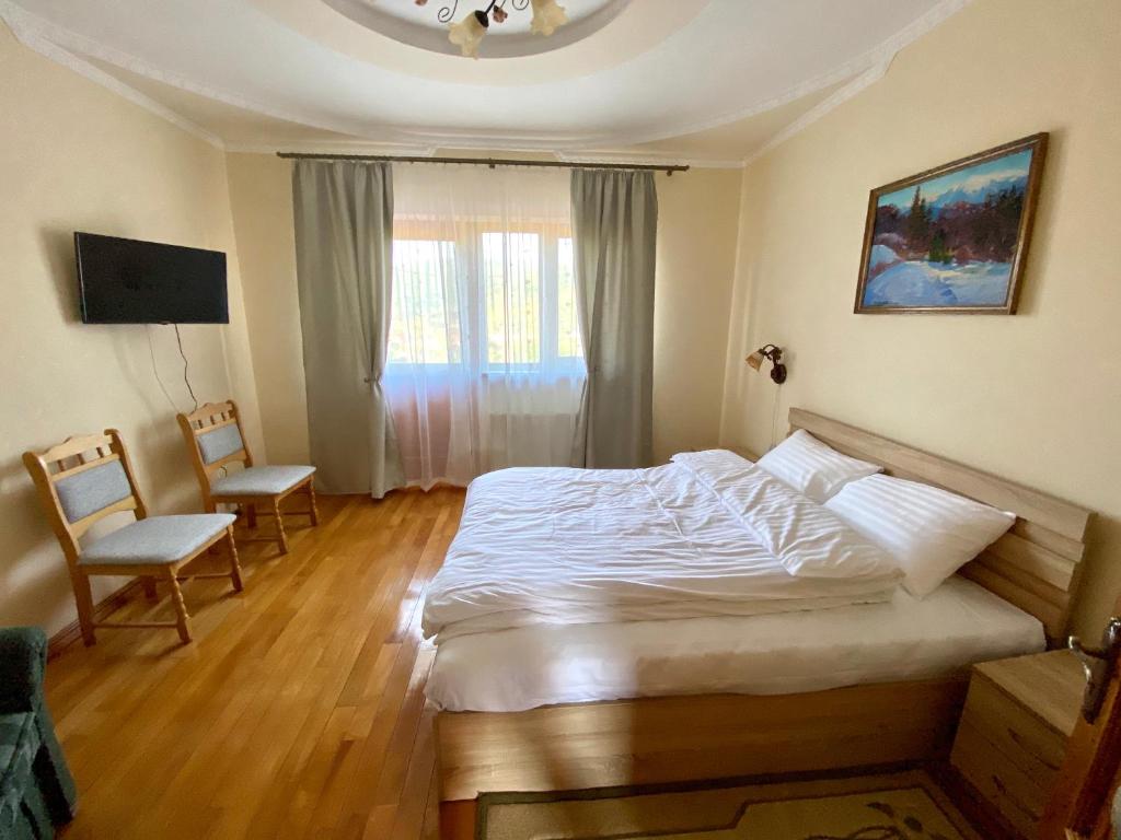 Postel nebo postele na pokoji v ubytování Guest house Mountain View