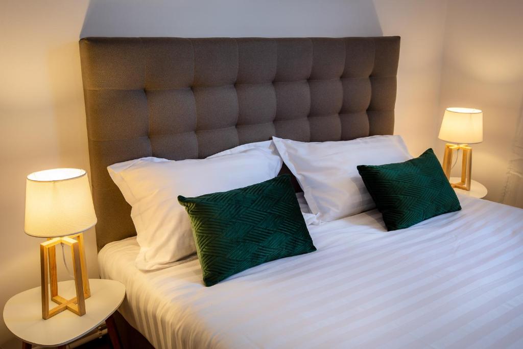 Postel nebo postele na pokoji v ubytování Lagom Hotel