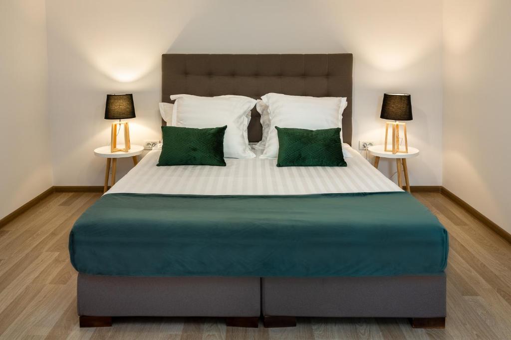Postel nebo postele na pokoji v ubytování Lagom Hotel