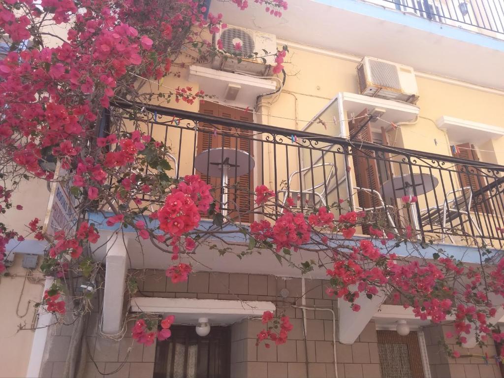 Balkón nebo terasa v ubytování HERMOUPOLI ROOMS