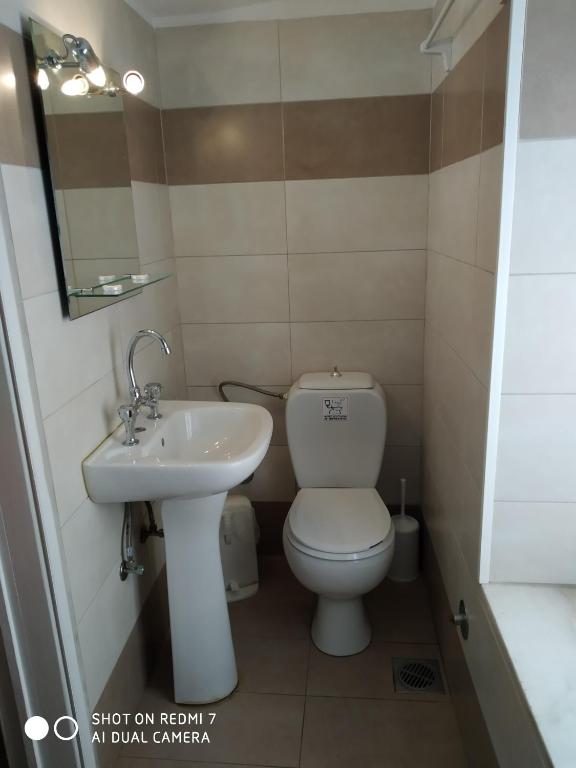 Koupelna v ubytování HERMOUPOLI ROOMS