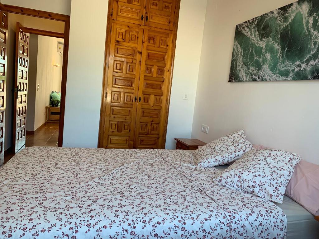 A bed or beds in a room at BADIA BEACH- Empuriabrava