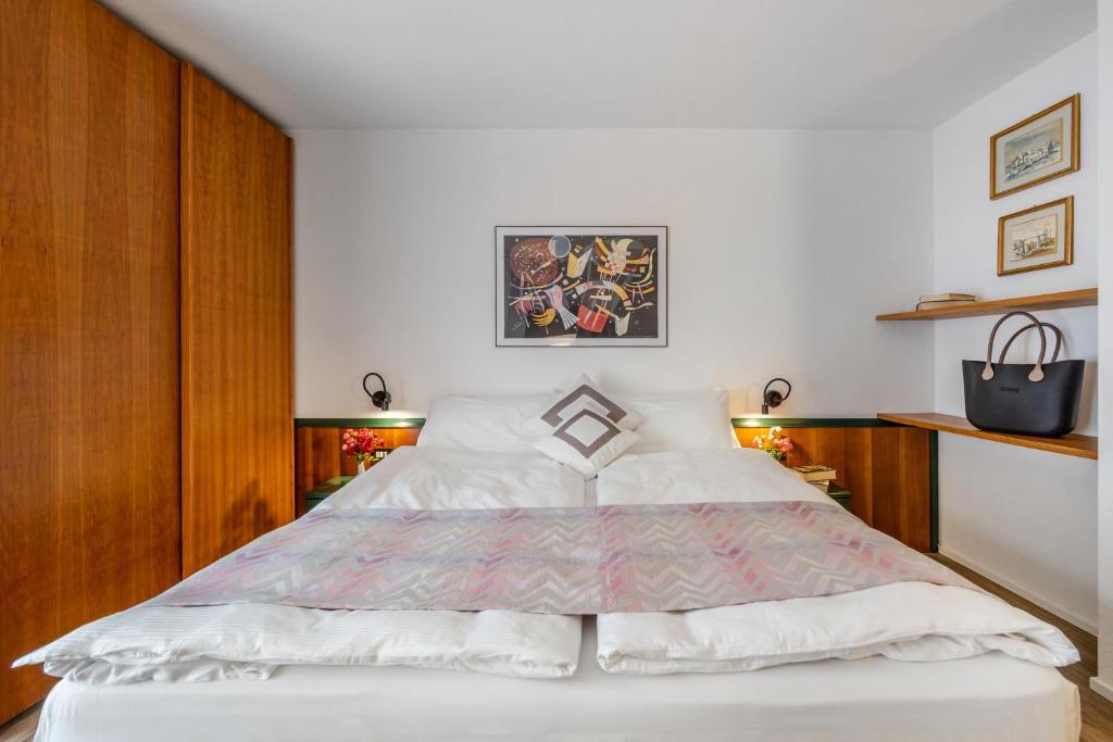 Postel nebo postele na pokoji v ubytování Pippo Hotel