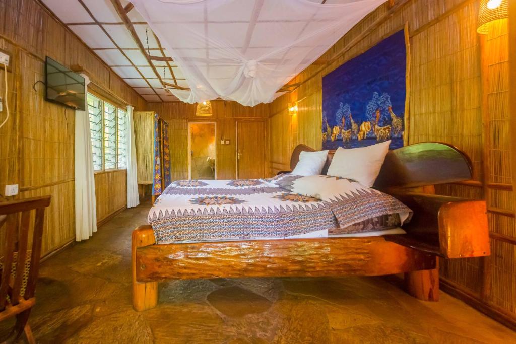 Postel nebo postele na pokoji v ubytování Ziwa Beach Resort