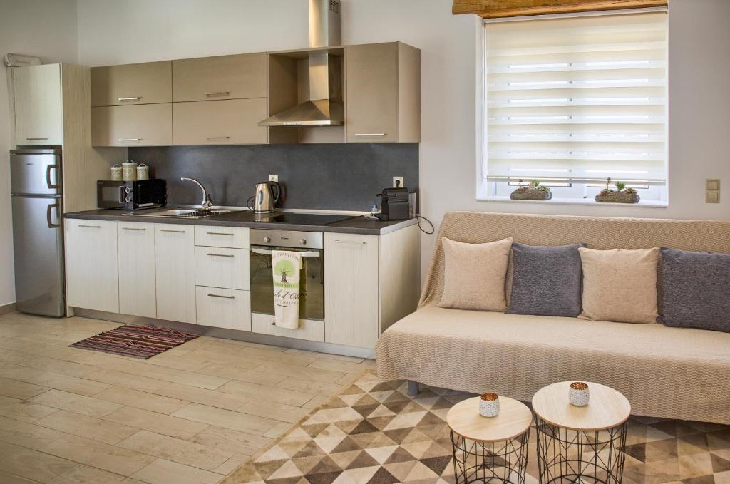 Kuchyň nebo kuchyňský kout v ubytování G&K Stone Suites