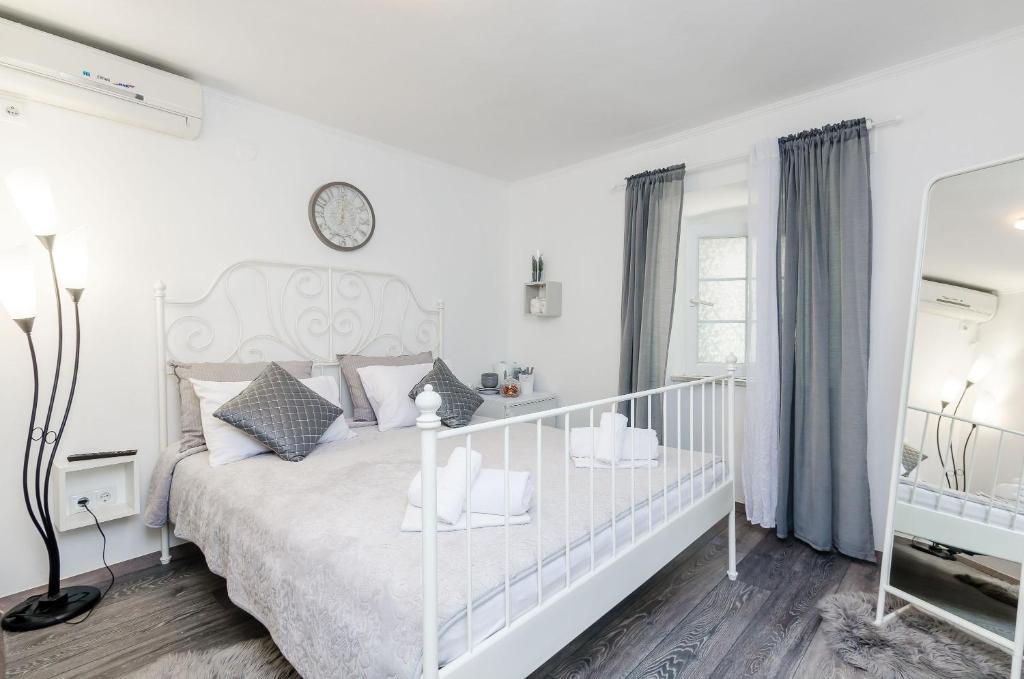 Posteľ alebo postele v izbe v ubytovaní Note Bene Rooms