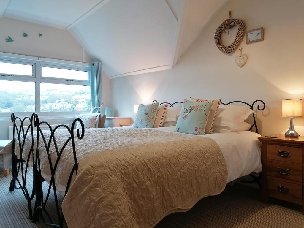 Ένα ή περισσότερα κρεβάτια σε δωμάτιο στο Schooner Point Guest House