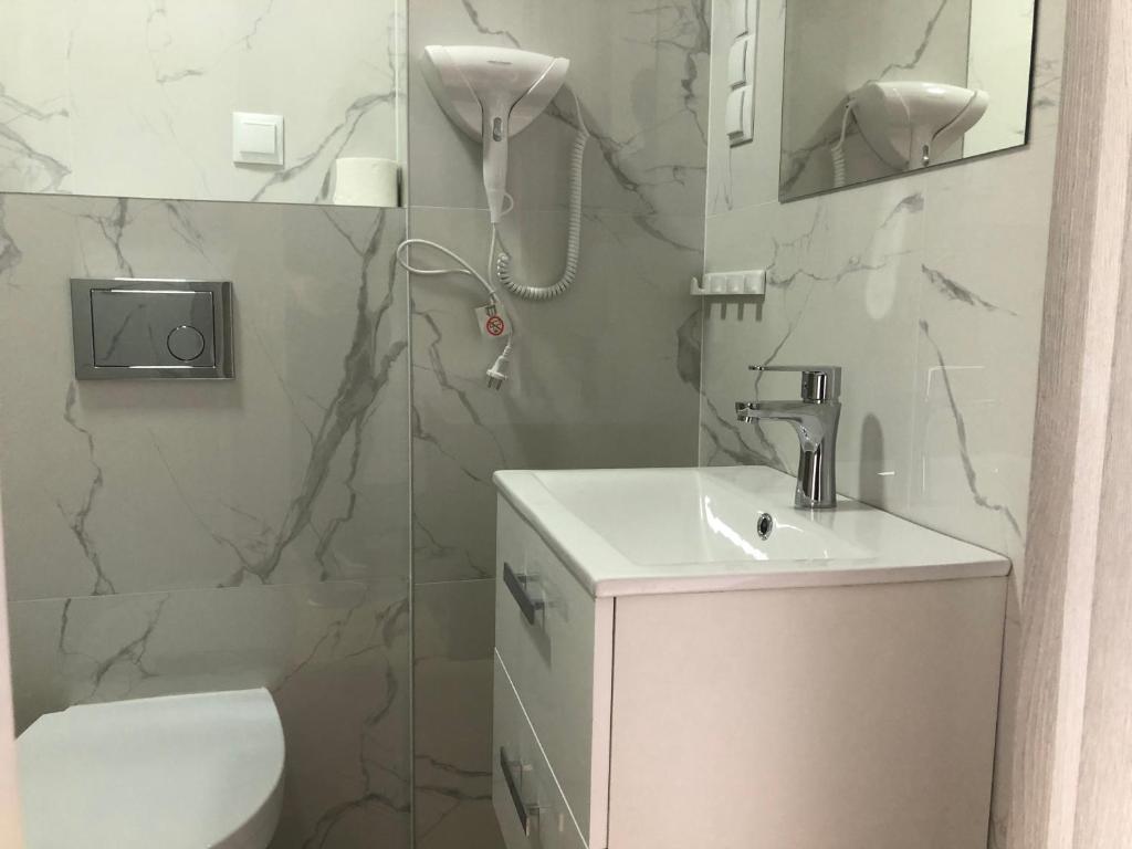 Kúpeľňa v ubytovaní Apartamenty "NaLetniej" Przy Morzu