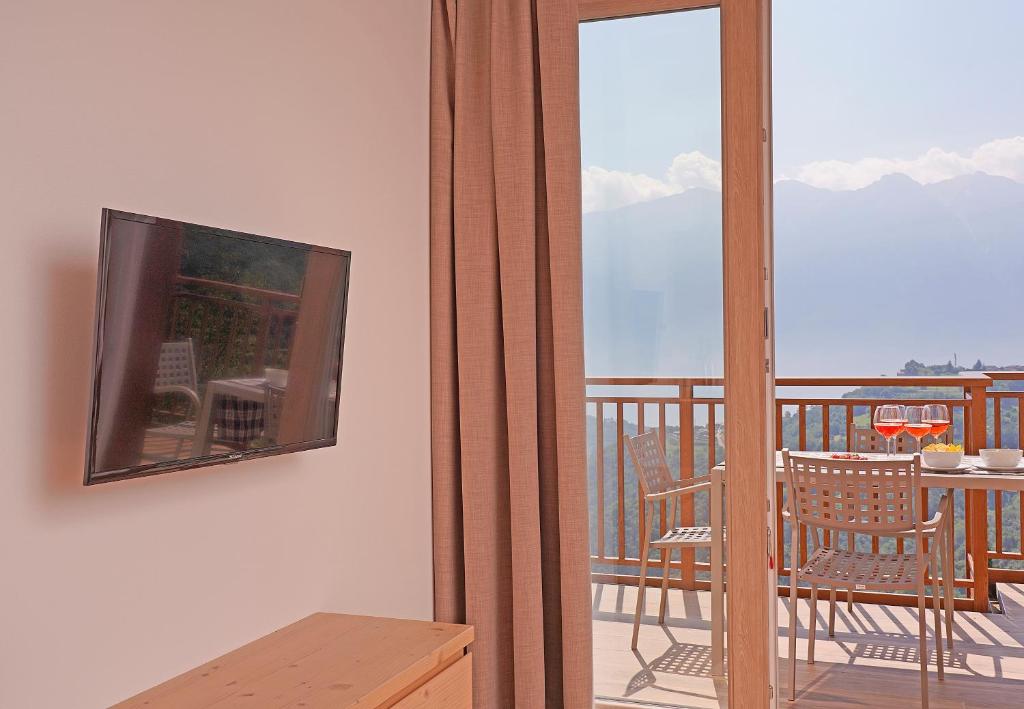 TV a/nebo společenská místnost v ubytování Agriturismo Hegemone