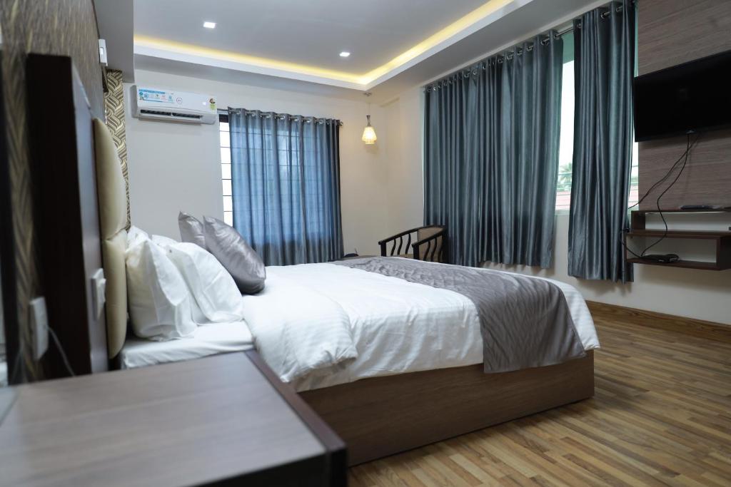 Postel nebo postele na pokoji v ubytování OLESSIA HOTEL