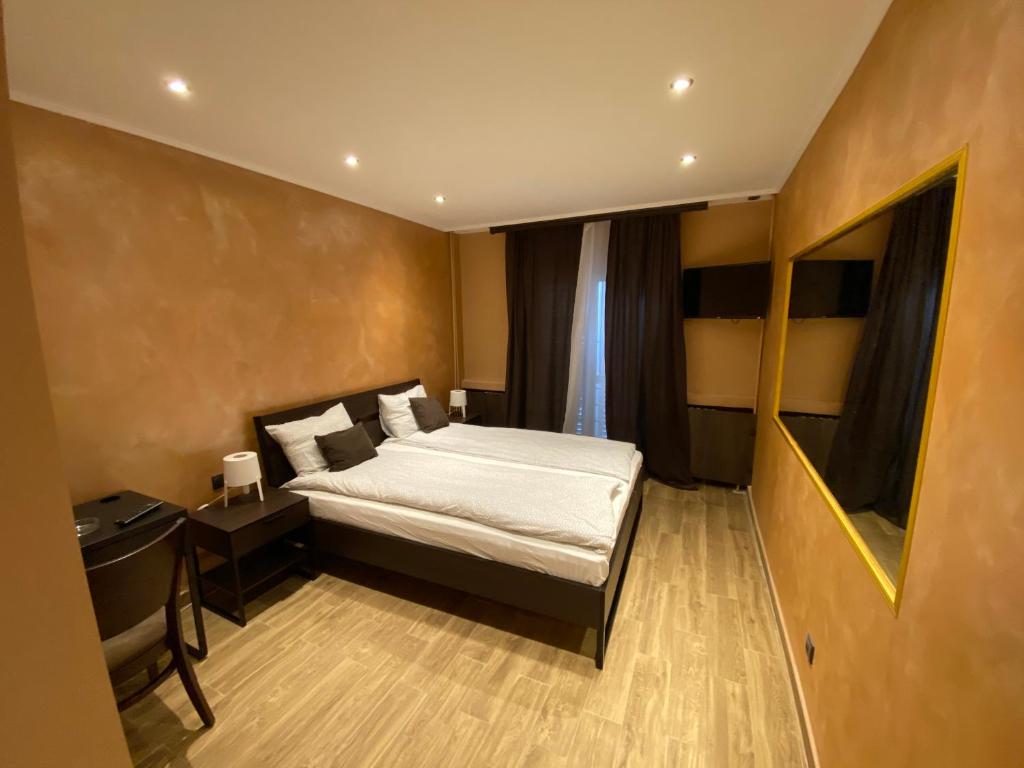Postel nebo postele na pokoji v ubytování Motel Stari Hrast